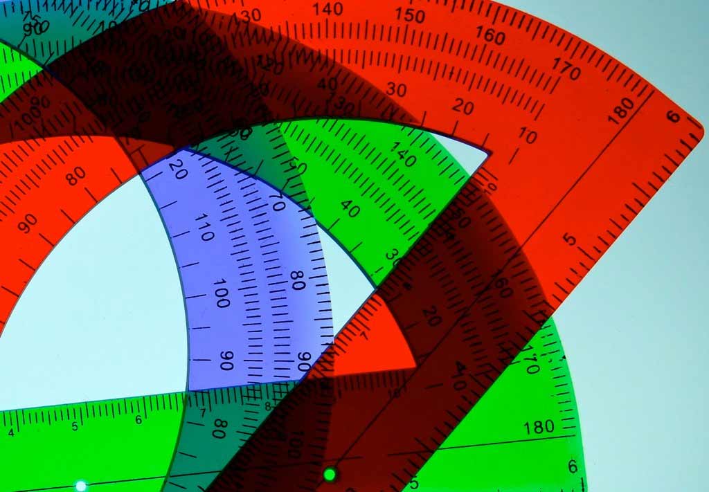 A photograph of multicolored, overlapped protractors